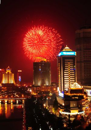 Scintillant firework flare up and brighten up the nocturnal sky during a grand firework celebration of the 60th anniversary of the founding of the People's Republic of China, in Guiyang, southwest China's Guizhou Province, September 30, 2009.