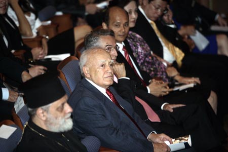 Greek President Papoulias (2nd L) presents the opening ceremony for the first Confucius Institute in Greece in Athens, capital of Greece, October 8, 2009. 