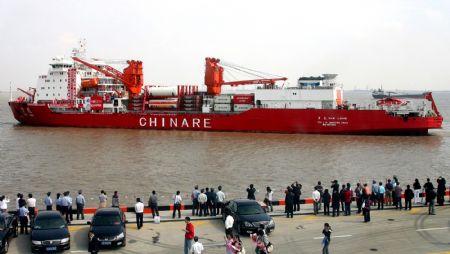 Icebreaker Xuelong, or 'Snow Dragon' prepares to leave for the country's 26th scientific expedition to the Antarctica, in Shanghai, east China, on October 11, 2009.