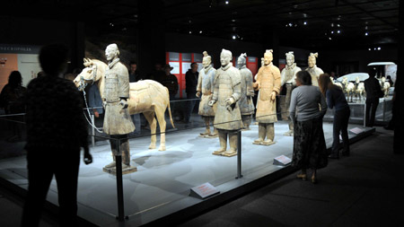 Visitors admire the displayed terra cotta warriors at the Houston Museum of Natural Science in Houston, the United States, on October 18, 2009. 