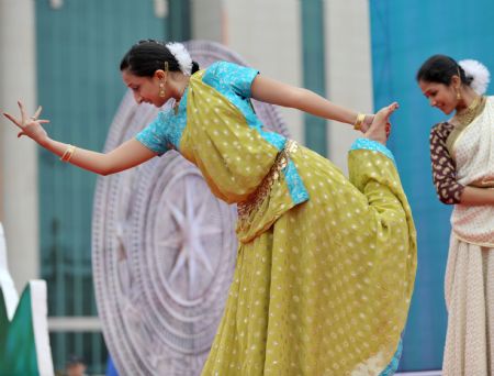 Indian artists dance at a 'Harmonious Nanning, Joyous Green City' activity in Nanning, capital of southwest China's Guangxi Zhuang Autonomous Region, October 22, 2009. 