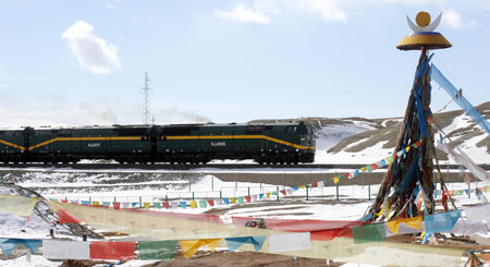 A train runs in the frozen earth area in Kunlun Mountain of northwest China&apos;s Qinghai Province, October 24, 2009.