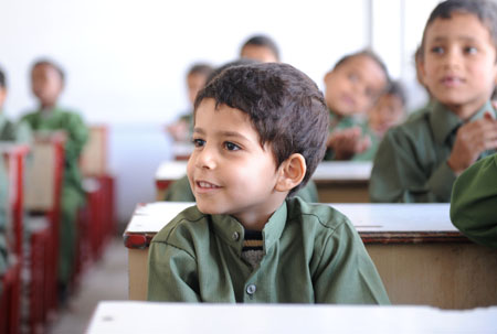 Pupils attend classes at a primary school in Sanaa, capital of Yemen, on November 3, 2009. Most primary and middle schools in Yemen have resumed classes recently after a two-or-three-month closure to prevent the large-scale outbreak of A/H1N1 influenza.