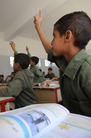 Pupils attend classes at a primary school in Sanaa, capital of Yemen, on November 3, 2009. Most primary and middle schools in Yemen have resumed classes recently after a two-or-three-month closure to prevent the large-scale outbreak of A/H1N1 influenza.