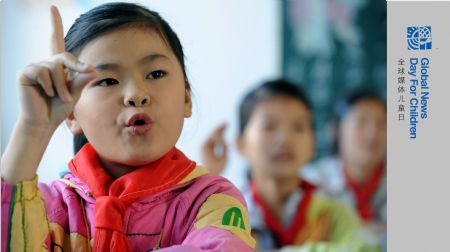 Xie Yuxing, a 10-year-old deaf and dumb girl from the mountainous region in northern Fujian Province, attends classes in Nanping, southeast China's Fujian Province, October 28, 2009.