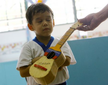 Jose Manuel Sanchez Aguero, a five-year-old boy, refuses to perform when he is in a mood at school in Barquisimeto, Venezuela, Oct. 30, 2009. Jose