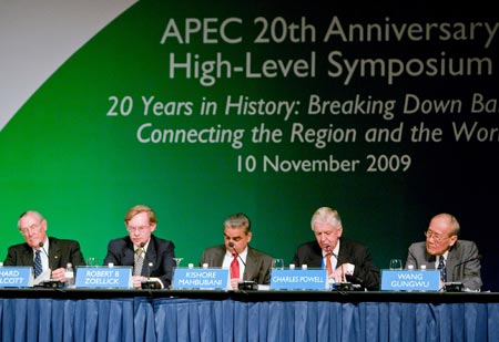 World Bank President Robert Zoellick (2nd L) speaks during the APEC 20th Anniversary High-Level Symposium in Singapore, November 10, 2009.