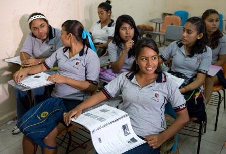 Mexican girl Iris Alvarez(front) is seen in class in Acapulco, Mexico, October 31, 2009. 