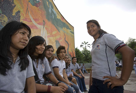 Mexican girl Iris Alvarez(R) poses with her classmates in Acapulco, Mexico, October 29, 2009.