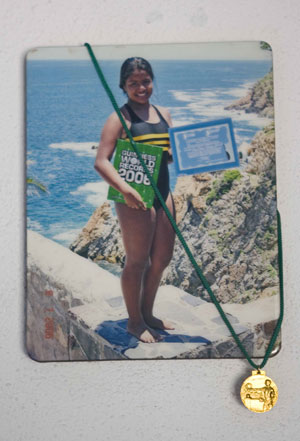 This undated file photo shows Mexican girl Iris Alvarez and her world record certificate in Acapulco, Mexico.