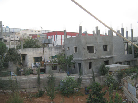 My name is Tala Nasser Ramadan, 11 years old. I live in Daheisheh refugee camp in the West Bank city of Bethlehem and study at a United Nations school in the camp. This photo I took on November 4, 2009 shows a house under construction in the Daheisheh refugee camp. Although Palestinians face many difficulties, they do not stop building houses.