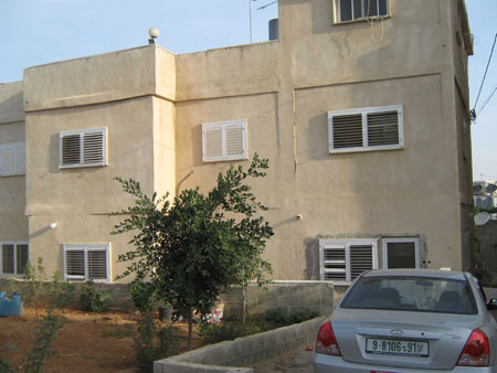 My name is Tala Nasser Ramadan, 11 years old. I live in Daheisheh refugee camp in the West Bank city of Bethlehem and study at a United Nations school in the camp. This photo I took on October 19, 2009 shows the house and car of my family.