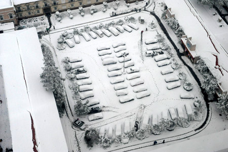 A parking lot is blanketed with snow in Zhengzhou, capital of central China's Henan Province, November 12, 2009. 