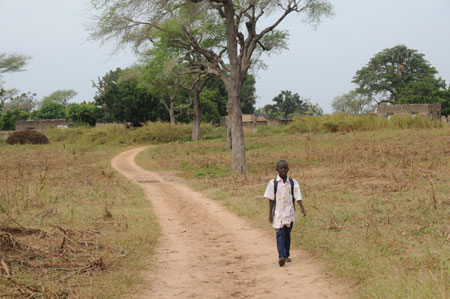 Seven-year-old Lamine goes to school in a village 80 kilometers north of Dakar, capital of Senegal, October 27, 2009.