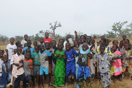 Seven-year-old Lamine poses with his schoolmates at school in a village 80 kilometers north of Dakar, capital of Senegal, October 27, 2009.