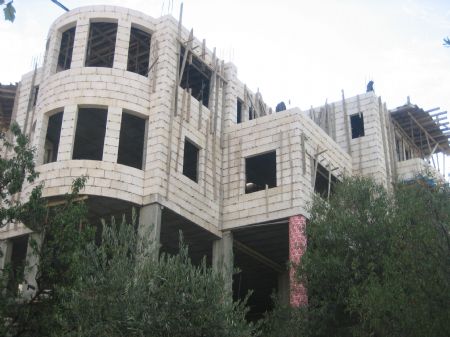 Photo taken by Mohammed Samir Skakeya shows a new house built at his village in the West Bank city of Bethlehem on October 4, 2009