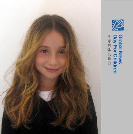 I am Alice Ascoli, 8 years old. I am living in Rome. Now I study in the 4th grade at San Giorgio International School in Rome. Photo taken on Oct. 28, 2009. (Xinhua/Estefania Ascoli)