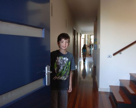 Photo taken on November 3, 2009 shows Jordan Hartman opening the door at home in Melbourne of Australia.