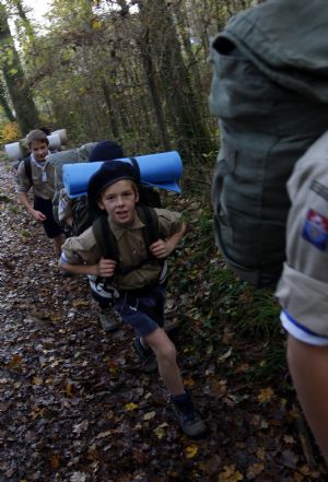 George walks with his teammates during a scout team camping, November 7, 2009. 