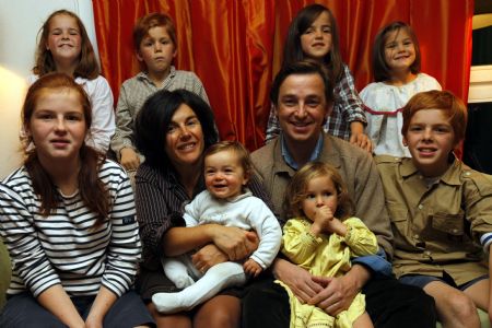 The Vassal family members pose for photo at home in Paris, November 9, 2009. 