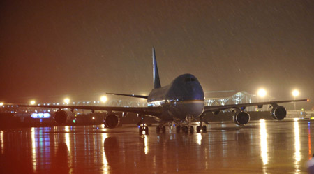 US President Barack Obama's special plane arrives at Shanghai Pudong International Airport on November 15, 2009. Barack Obama arrived in Shanghai on Sunday to begin his first state visit to China.