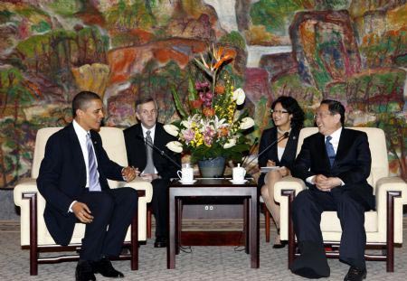 US President Barack Obama(L1) meets with Yu Zhengsheng(R1), member of the Political Bureau of the Communist Party of China (CPC) Central Committee and secretary of the CPC Shanghai Municipal Committee, at the Xijiao State Guest House in Shanghai, November 16, 2009. 