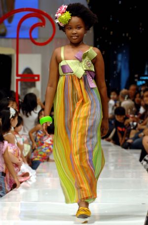 A girl presents a creation during the Jakarta Fashion Week in Indonesia's capital, November 15, 2009.