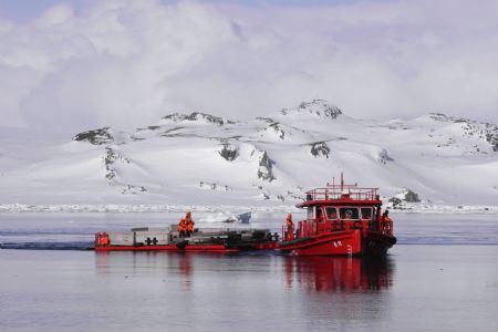&apos;Yellow River&apos; boat of Chinese exploration team transports supplies to the Great Wall Station in Antarctic, November 16, 2009.