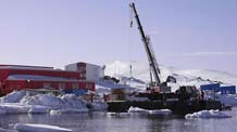 Chinese exploration team unloads supplies at the port of the Great Wall Station in Antarctic, November 16, 2009.