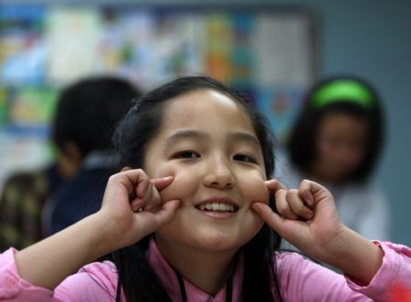 South Korean girl Lin Su Ting poses for photos in Seoul, capital of South Korea, November 11, 2009. 