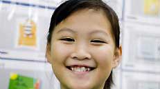 Undated photo shows nine-year-old Liang Zhuoru in Hong Kong, south China. Liang's father is a public servant and her mother a housewife. She dreams to be a firefighter in the future.