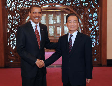 Chinese Premier Wen Jiabao meets visiting US President Barack Obama in Beijing on November 18, 2009. 