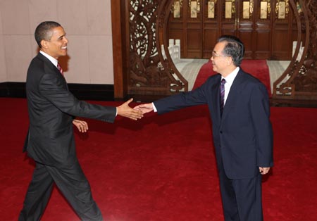 Chinese Premier Wen Jiabao meets visiting US President Barack Obama in Beijing on November 18, 2009.
