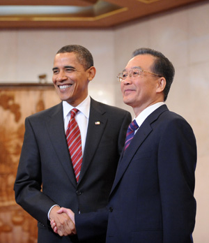 Chinese Premier Wen Jiabao meets visiting US President Barack Obama in Beijing on November 18, 2009.