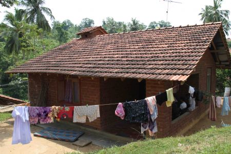 Photo taken on October 17, 2009 shows Heshani's home at a reconstructed village after tsunami in Matara, southern Sri Lanka.