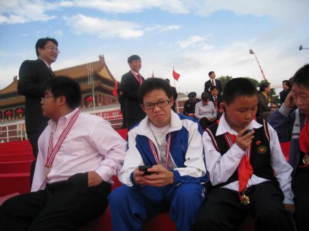 Xu Zhongzheng (2nd R) are invited to attend the grand parade in celebration of the 60th anniversary of the founding of the Peoples' Republic of China on Tian'anmen Square in Beijing, capital of China, October 1, 2009.