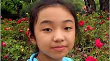 My name is Pataramon Theinjarunchai. I was born on January 4, 1999. I am a 5th grader and lives with my father, mother and grandparents. My hobbies are studying Chinese and swimming. This is my picture taken on October 22, 2009.