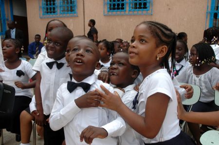 Pupils attend a celebration for the Universal Children's Day in Lome, capital of Togo, November 18, 2009.