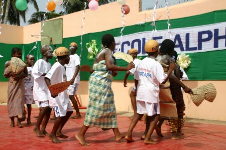 Pupils attend a celebration for the Universal Children's Day in Lome, capital of Togo, November 18, 2009.