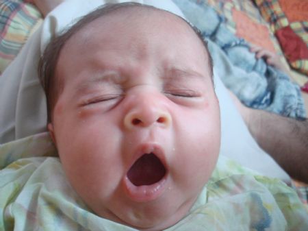 This picture taken on July 24, 2008 shows my one-month old cousin closes her eyes while yawning.