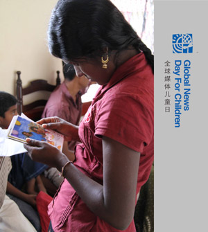 A girl looks at her family photos at the Colombo Hindu College Ratmalana on November 15, 2009. All of the 154 boys and 119 girls studying here used to be child soldiers of the Liberation Tigers of Tamil Eelam (LTTE). They were transferred to this school after Sri Lanka's government troops defeated the LTTE earlier this year. 