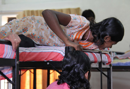 A girl in the dormitory at the Colombo Hindu College Ratmalana on November 15, 2009. All of the 154 boys and 119 girls studying here used to be child soldiers of the Liberation Tigers of Tamil Eelam (LTTE). They were transferred to this school after Sri Lanka's government troops defeated the LTTE earlier this year. 