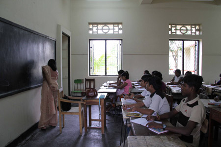 Students attend class at the Colombo Hindu College Ratmalana on November 15, 2009. All of the 154 boys and 119 girls studying here used to be child soldiers of the Liberation Tigers of Tamil Eelam (LTTE). They were transferred to this school after Sri Lanka's government troops defeated the LTTE earlier this year. 