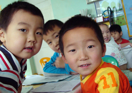 I am Adiyabazar, nine years old, a third grade student in Ulan Bator, capital of Mongolia. There are four members in my family. They are my father and mother, younger brother and I myself. I love photography and I took a lot of pictures when I was traveling in Beijing, capital of China. The photo I took on October 27 shows my friends in Ulan Bator.