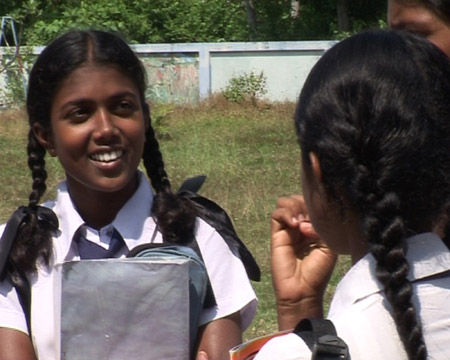 Photo taken on October 27, 2009 shows Primali Surasena with her classmates. Five years after losing her father in the Indian Ocean tsunami that killed more than 35,000 people and displaced half a million others in Sri Lanka, 14-year-old Primali Surasena has become a healthy and bright girl.