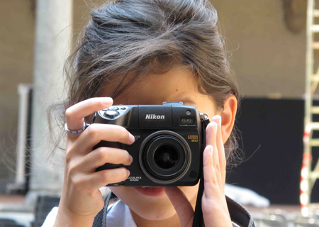 I'm John Peter Dirks. I was born in Hamburg, Germany. My mom is Chinese and my dad is German. And I have a twin sister, named Anne Li Dirks. I took this picture in Hamburg and it shows my sister Anne taking pictures.