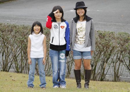 Photo taken on October 25, shows Yuka Oh and her elder sisters.