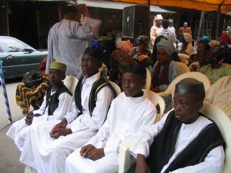 The picture I took on August 9, 2009 shows my brother (R, front) in a Mosque ceremony in Lagos.