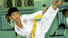 Elnur attends a training class of karate at an indoor gym at school in Bishkek, capital of Kyrgyzstan, on October 27, 2009.