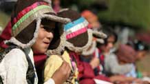 A Nepalese child wearing a traditional dress attends an event to mark the Universal Children's Day at the presidential palace in Kathmandu, capital of Nepal, November 20, 2009. Nepal celebrated the Universal Children's Day with various programs across the country on Friday.